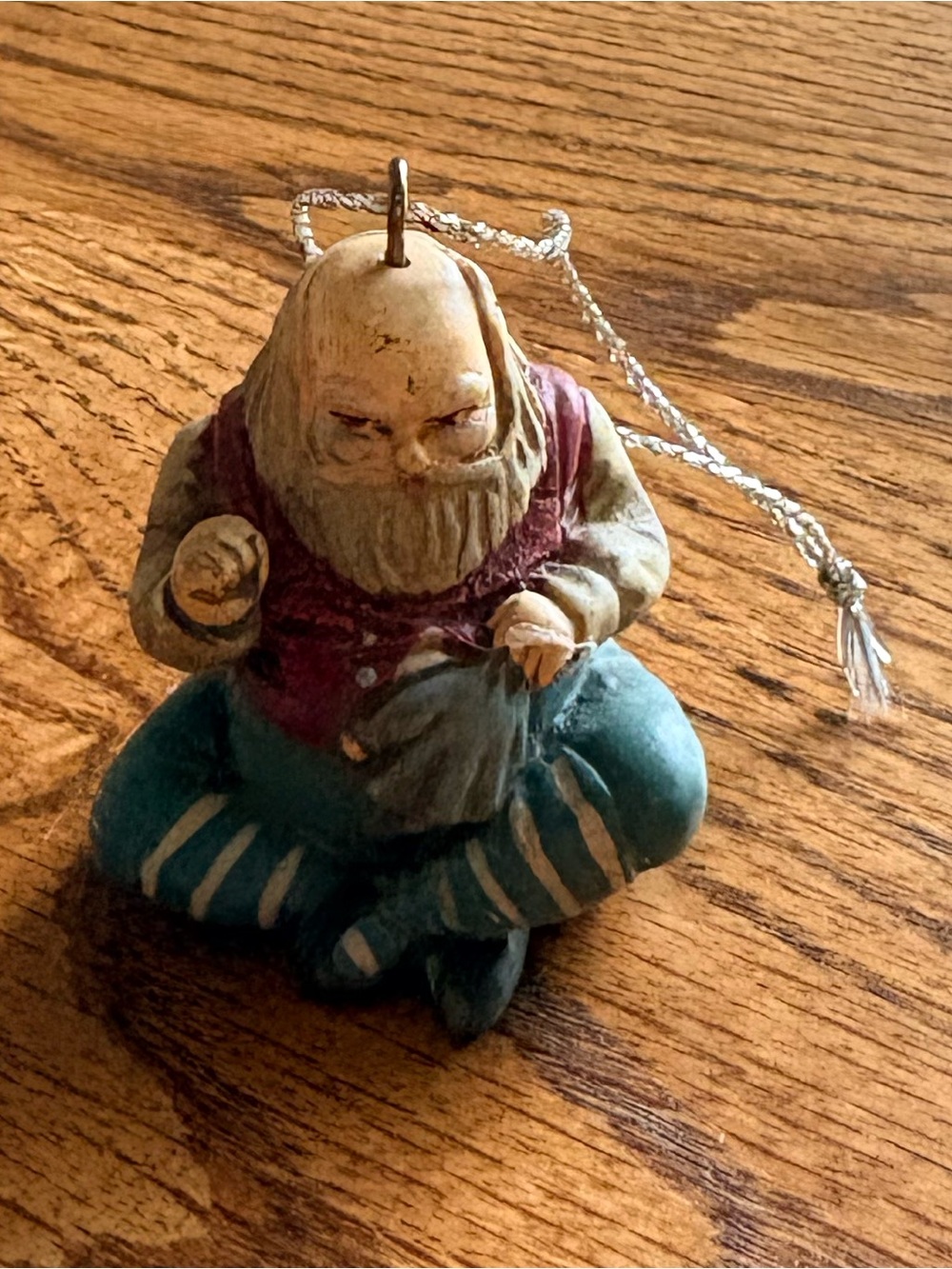 Midwest Blue & Red Santa fixing a doll Christmas Ornament